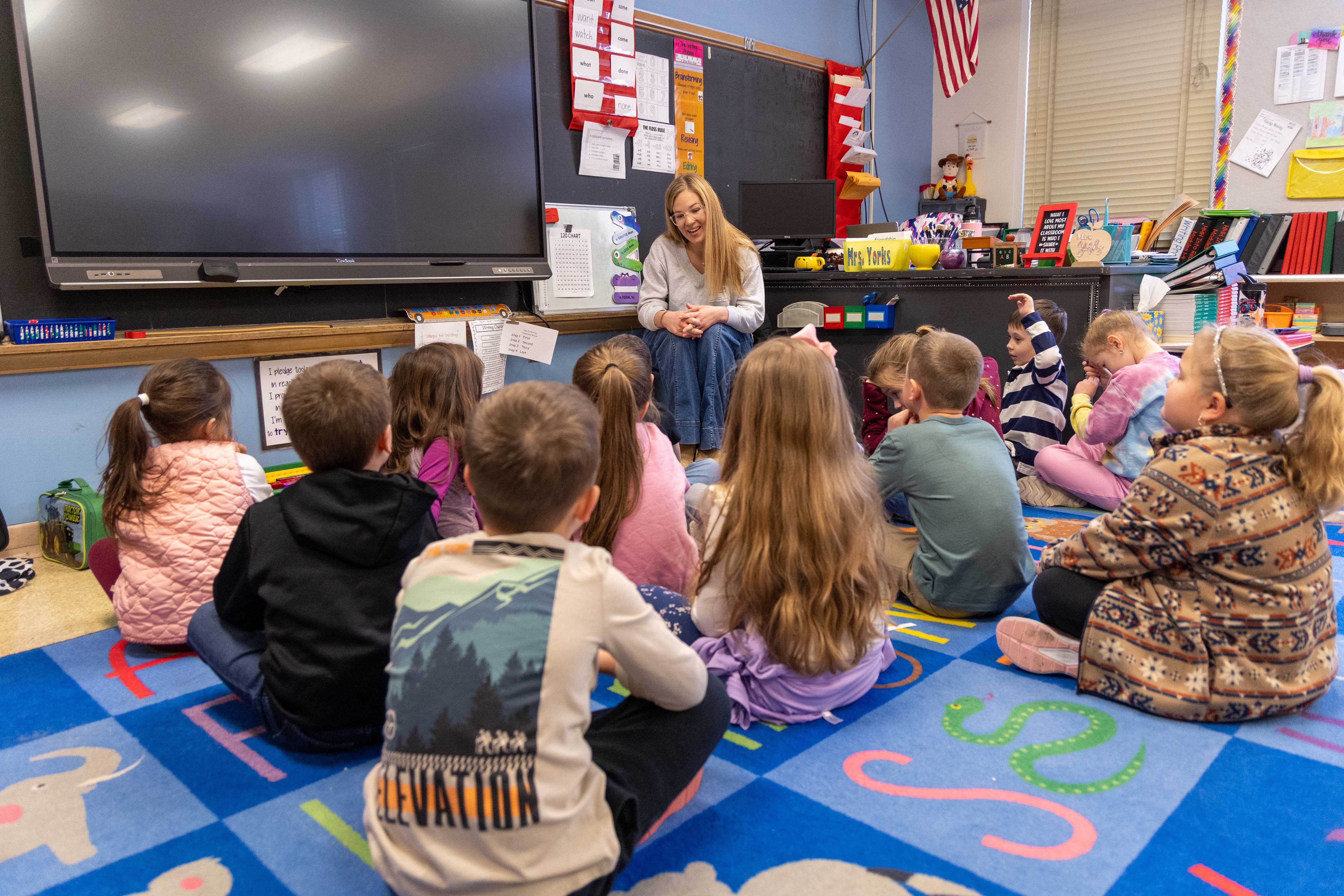 Benson smiles too all the students in the class